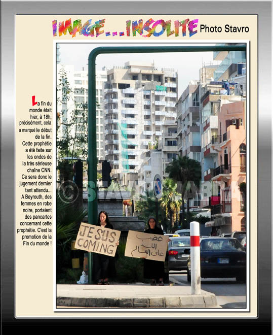 photo stavro - A Beyrouth, des femmes en robe noire, portaient des pancartes concernant la prophtie de la Fin du monde