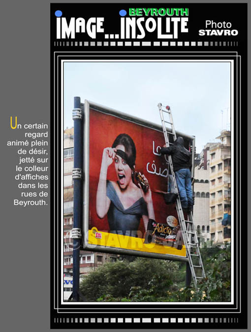 photo stavro - Un certain regard anim plein de dsir, jett sur le colleur d'affiches dans les rues de Beyrouth